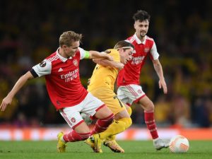 Martin Odegaard making a tackle